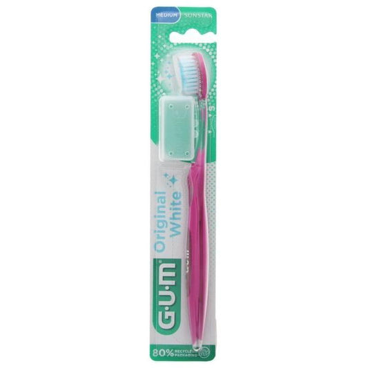 GUM Original White 563 medium toothbrush by Pasteur Pharmacy in assorted colors, designed for effective oral cleaning.