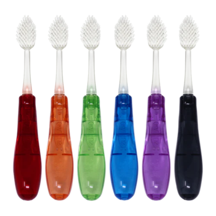 Radius Tour travel toothbrush by Pasteur Pharmacy with soft, replaceable head in assorted colors, designed for convenient oral care.