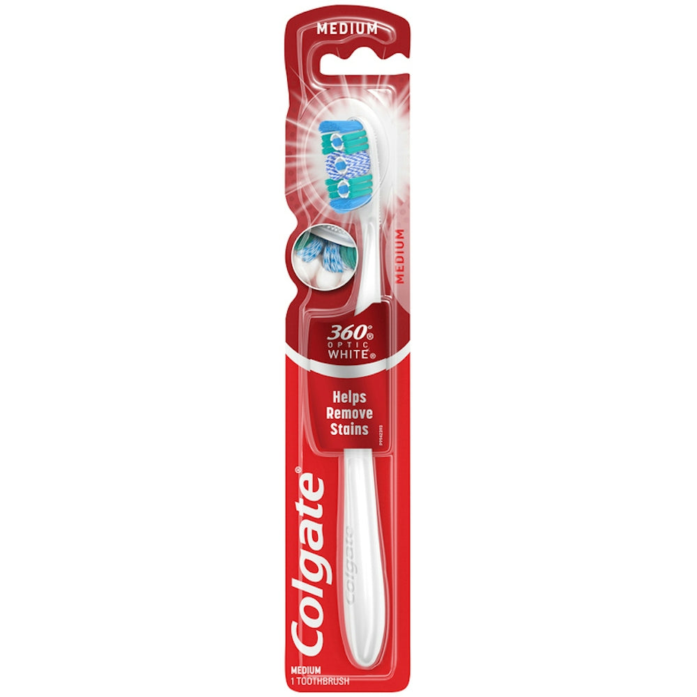 Colgate 360 Optic White full head toothbrush with medium bristles, whitening and tongue cleaner, shown in close-up.