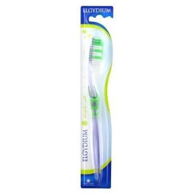 Green Elgydium Inter-Active Soft toothbrush from Pasteur Pharmacy, showing the soft bristle head and ergonomic handle.