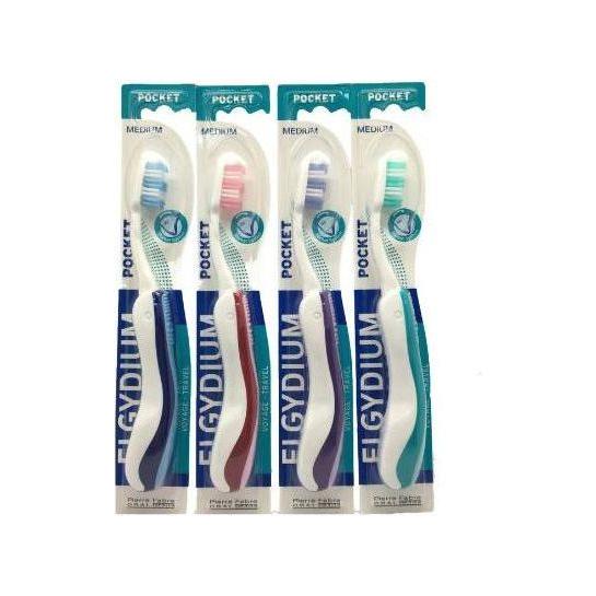Elgydium Pocket Travel Medium Toothbrush by Pasteur Pharmacy with assorted colored handles, compact for travel use.