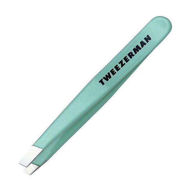 Stainless Mini Slant Tweezer by Tweezerman in Green Tea color, featuring precise slant tips for eyebrow grooming and hair removal.