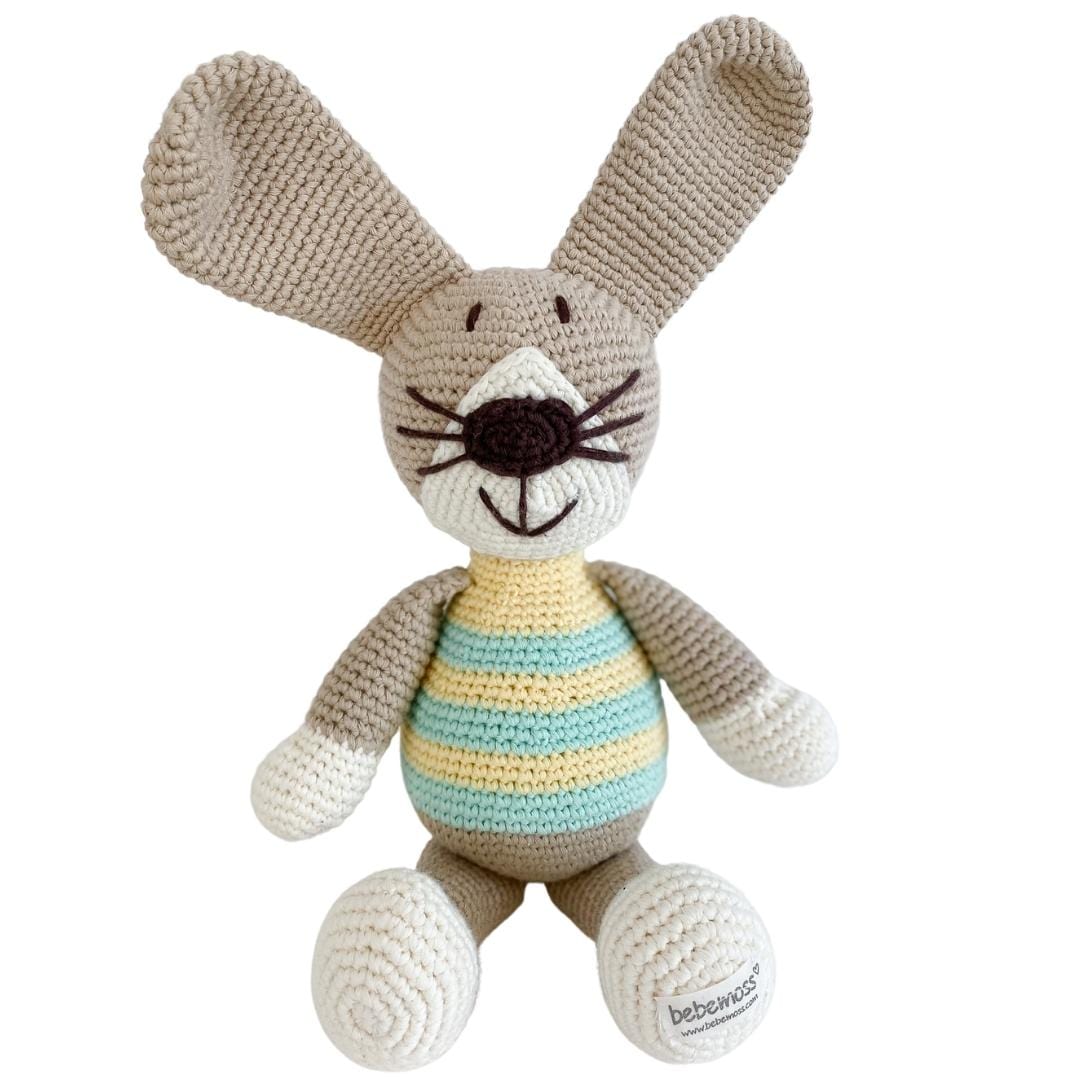 Green handmade stuffed rabbit named Pip by Bebemoss, made from organic cotton, soft and cuddly for children.