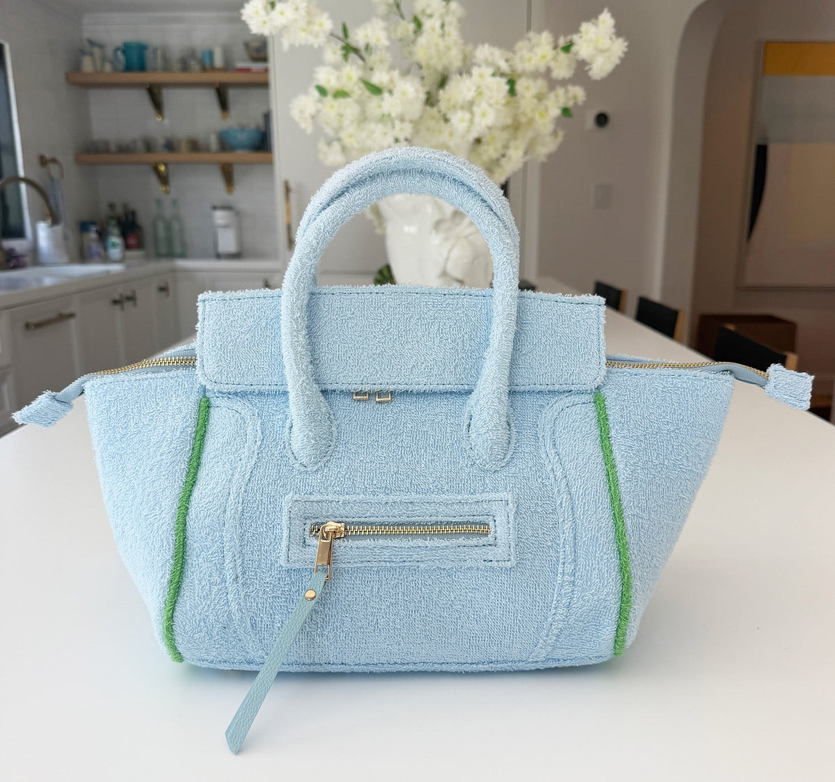 Powder blue Cabana Tote Mini bag by BEACH HAUS with woven texture and sturdy handles, perfect for casual outings.