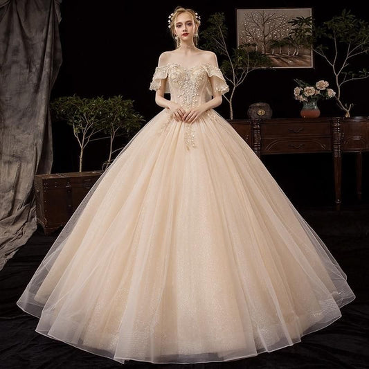 Shiny vintage off-shoulder wedding dress with crystal bead embellishments by EdleessFashion, luxurious gown for special occasions.