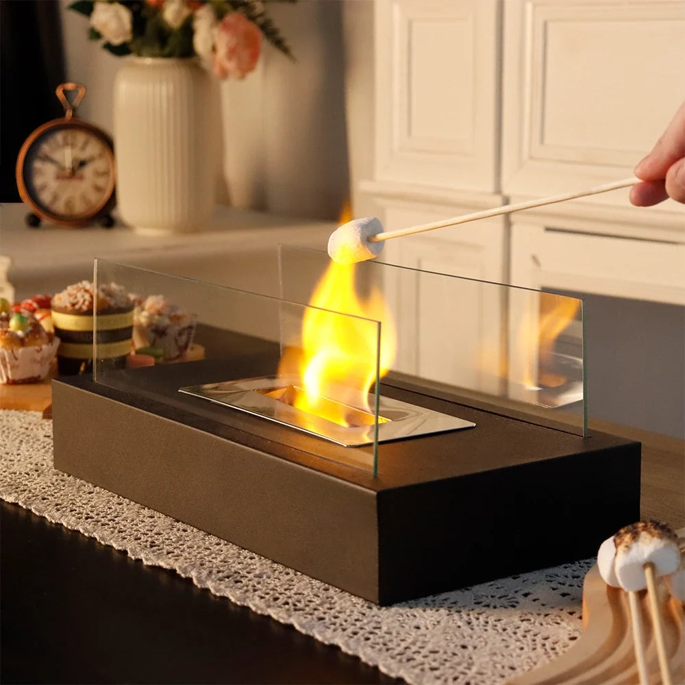 Square JHY DESIGN tabletop fire bowl with two-sided glass, designed for gel and ethanol fireplaces, suitable for outdoor patio use.