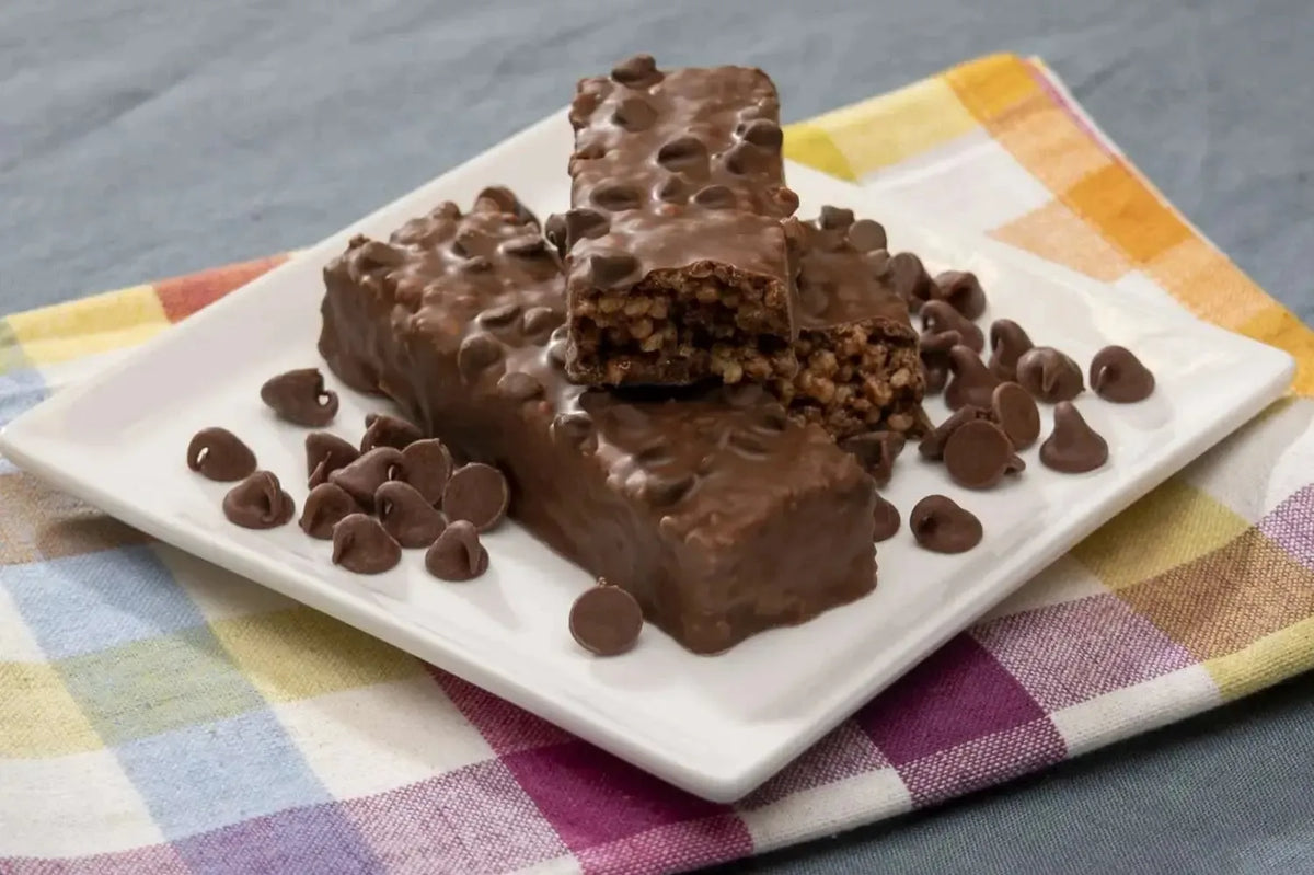 AmBari Nutrition Choc-A-Lot Chip Bar, a chocolate protein bar with visible chocolate chips and a textured surface.