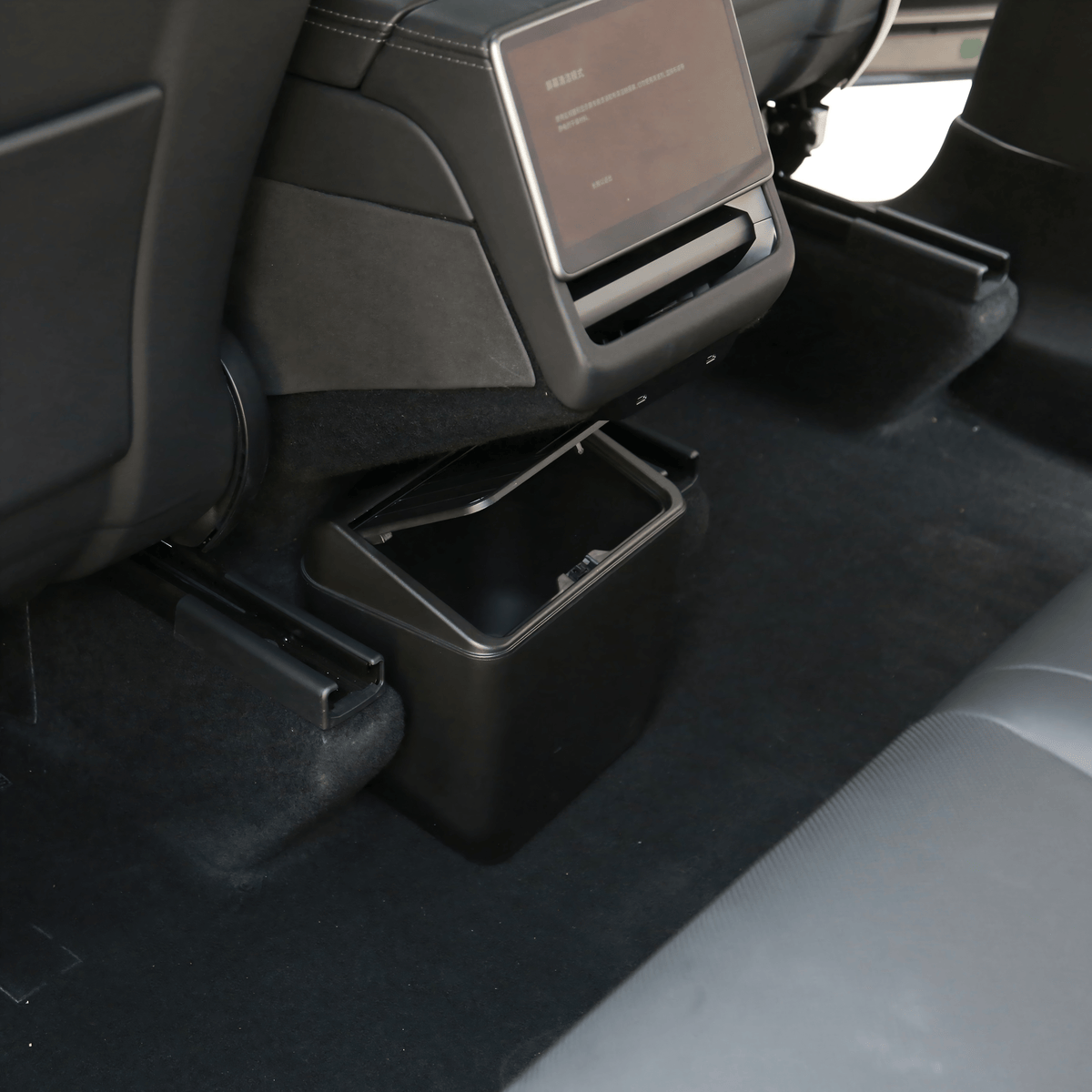 Tesla Model Y rear seat storage box trash can in Juniper color, designed for organized vehicle interior storage.