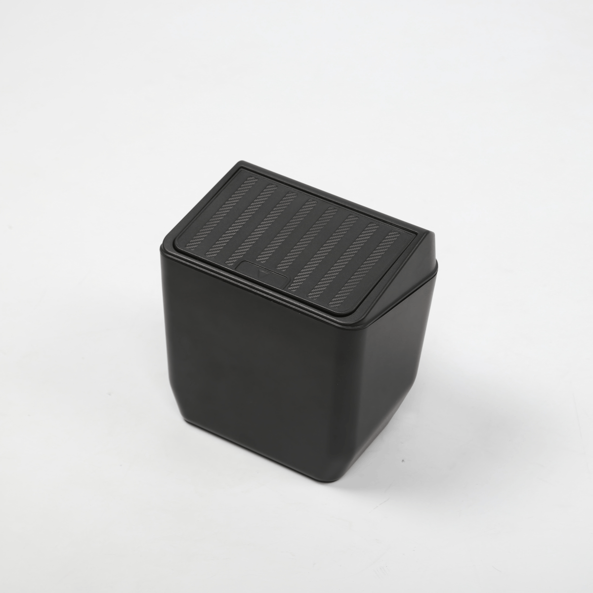 Tesla Model Y rear seat storage box and trash can in Juniper color, designed for organized vehicle interior storage.