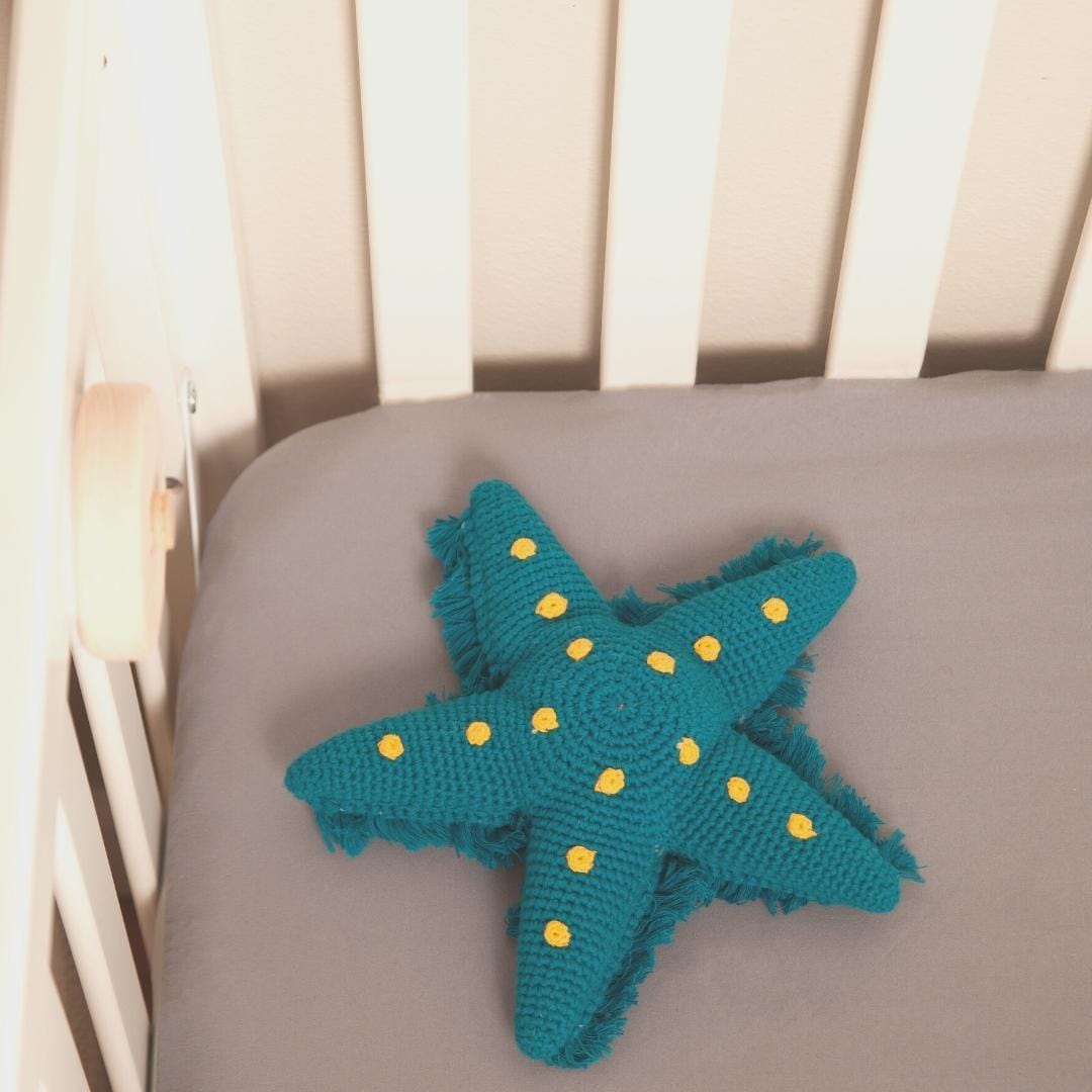 Handmade organic cotton starfish stuffed animal in lagoon blue, perfect for kids, by Bebemoss.