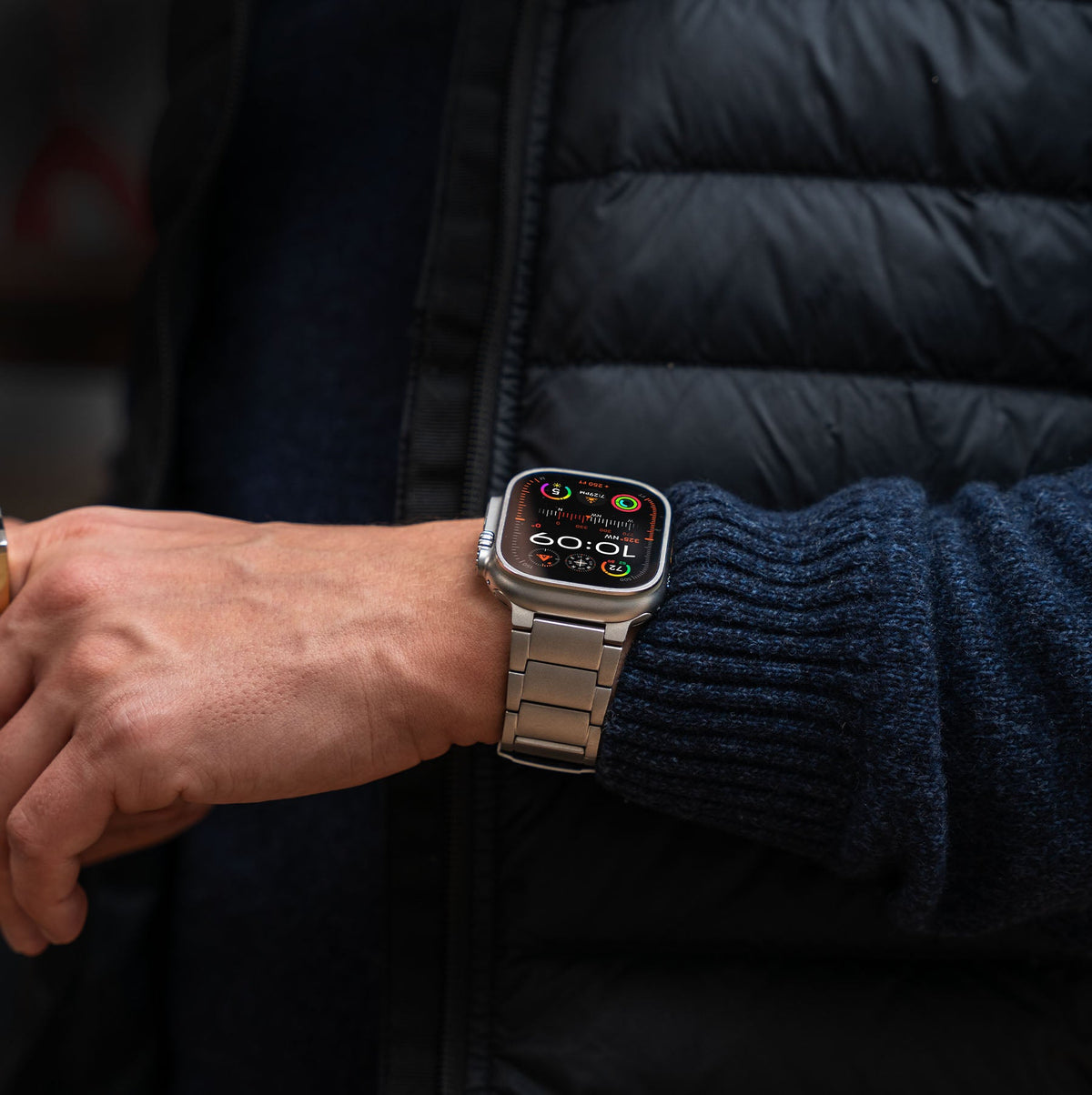 Robust Titanium Band T01, sleek and polished titanium ring with a smooth finish, designed for durable and stylish wear.