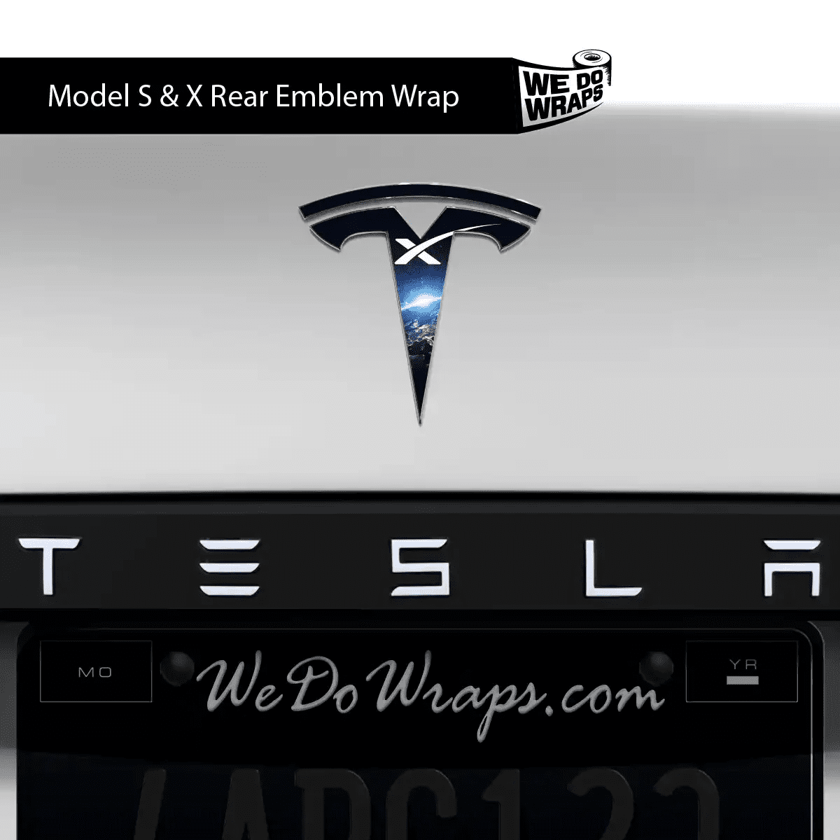 Tesla Model S with SpaceX Tesla emblem decals on front and back, showcasing sleek automotive decal design.