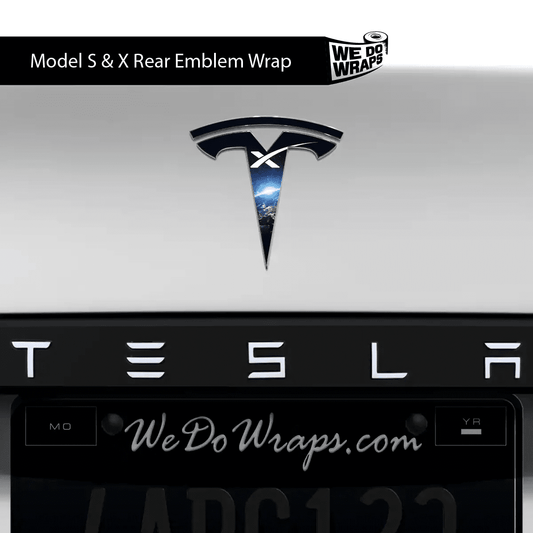 Tesla Model S with SpaceX Tesla emblem decals on front and back, showcasing sleek automotive decal design.