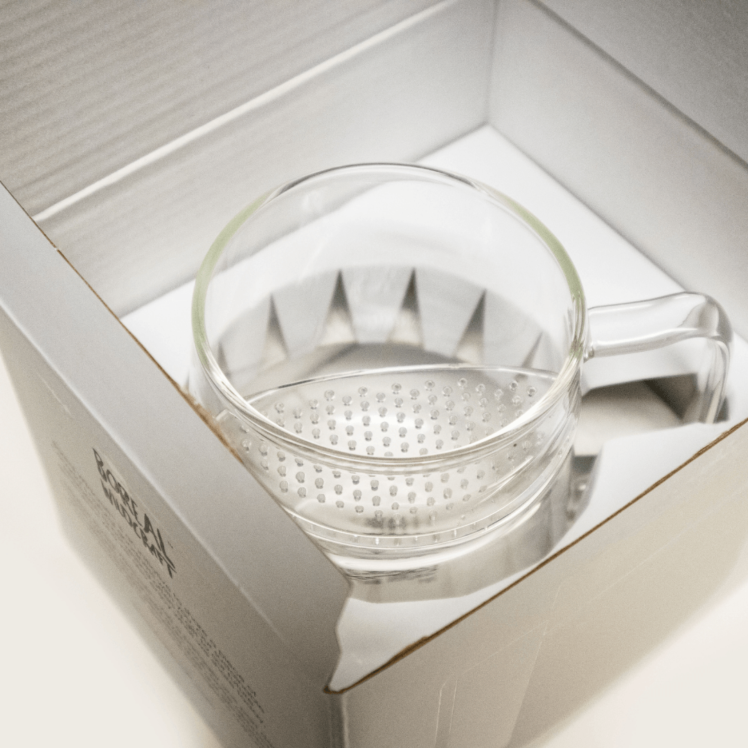 Nepal Tea The WALL® Tea Infuser in stainless steel, designed for brewing loose leaf tea with a mesh basket and handle.