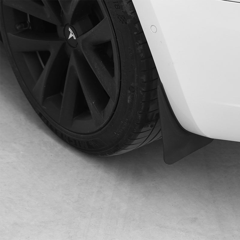 Tesla Model 3 Highland TPE+PP mud flaps by Tesery Official Store, showing durable black mud flaps attached to vehicle wheels.