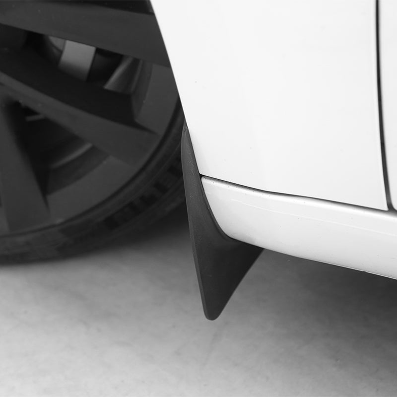 Tesla Model 3 Highland TPE and PP mud flaps by Tesery Official Store, showing durable black mud flaps installed on vehicle wheels.