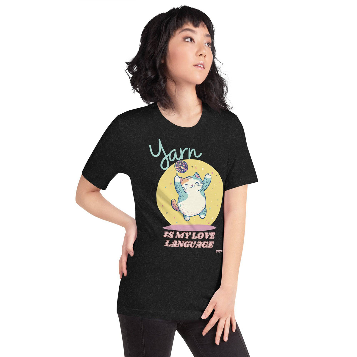 Black heather unisex T-shirt from Darn Good Yarn featuring “Yarn is My Love Language” text on the front.