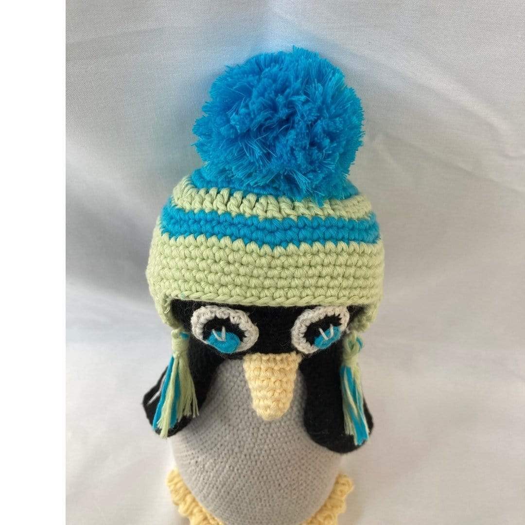 Handmade Willy the penguin stuffed animal made from organic cotton, soft and cuddly, perfect for children and collectors.