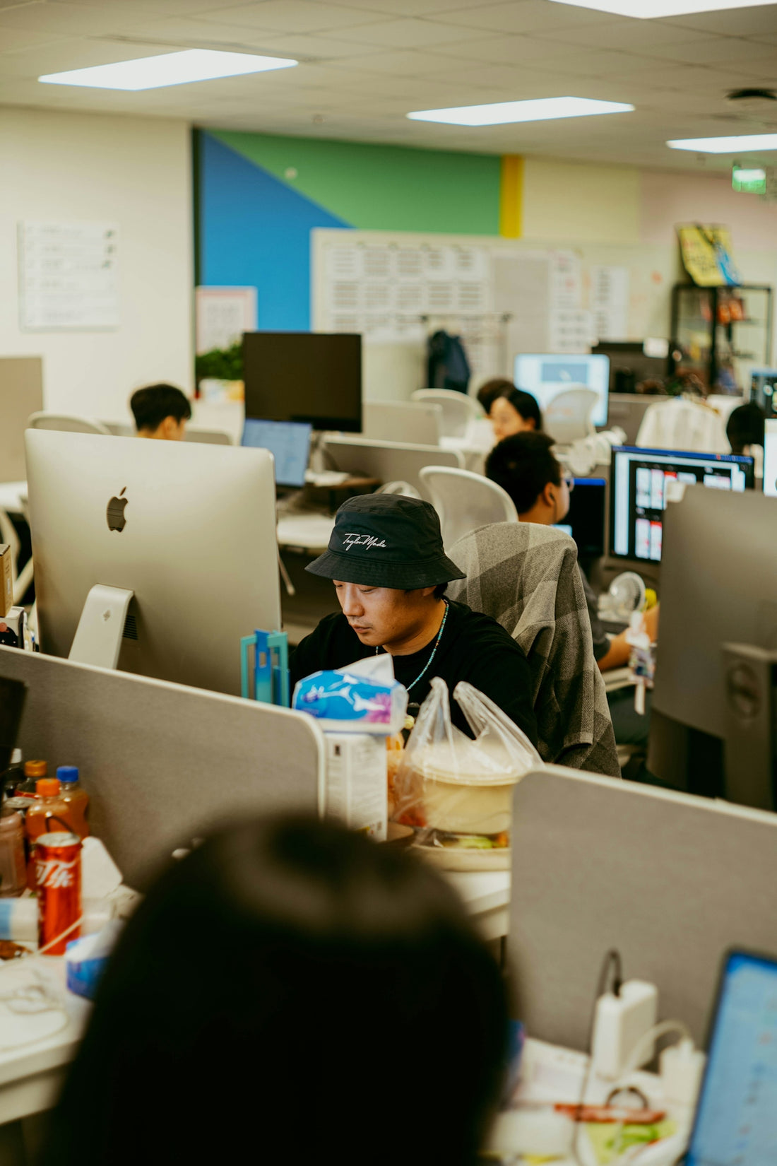 People working at computers in a modern office