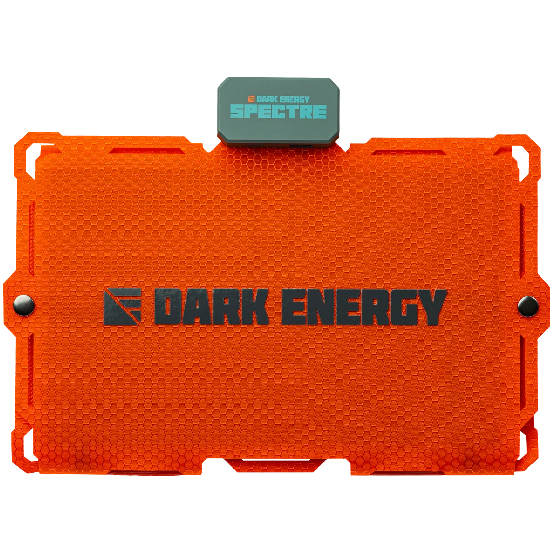 Dark Energy Spectre 18W solar panel shown outdoors with multiple photovoltaic cells in a compact, lightweight design.