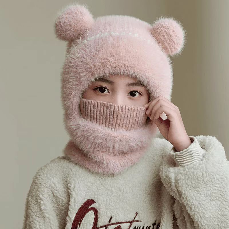 Warm windproof knitted wool hat with earflaps in a cozy winter style
