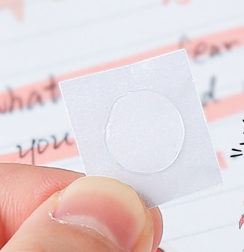 Transparent double-sided nano dot adhesive tape by BACKUPMYFILESNOW® shown on a white background with close-up of the tape's surface.