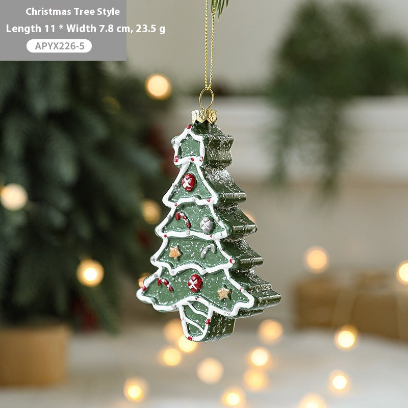 Painted plastic Christmas tree pendant decoration in festive holiday colors