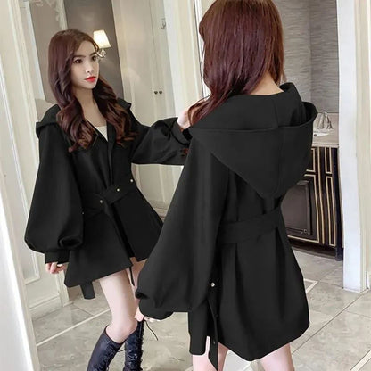 Women’s winter and autumn hooded trench coat in a classic longline design
