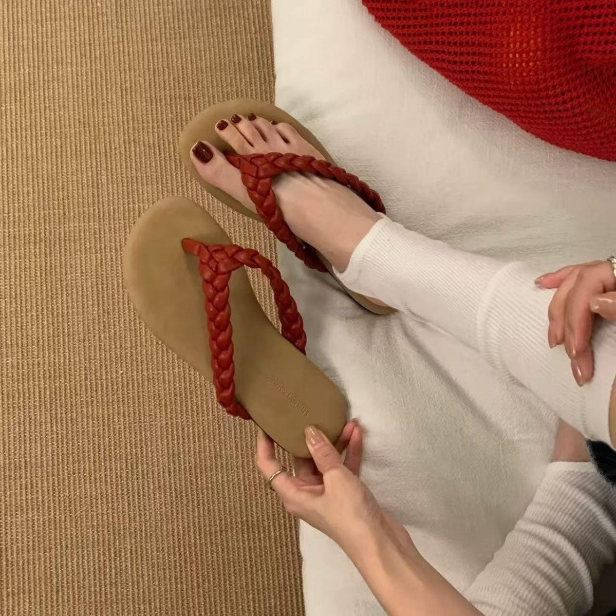 Retro flat minimalist woven flip-flops in a simple sandal design