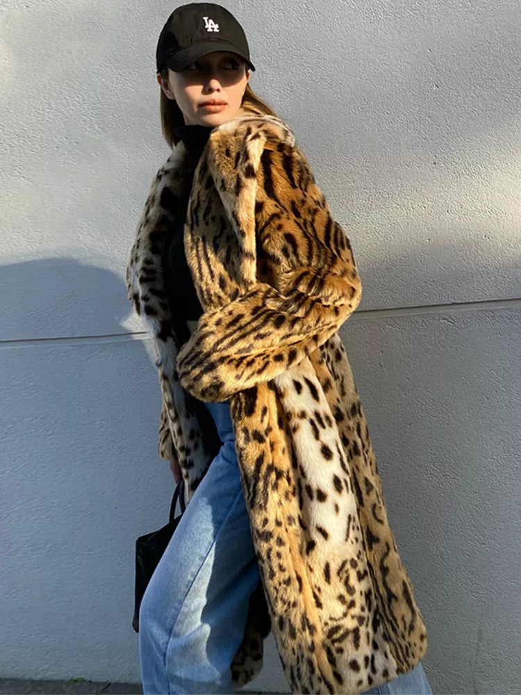 Women’s leopard print faux fur coat in a plush textured finish