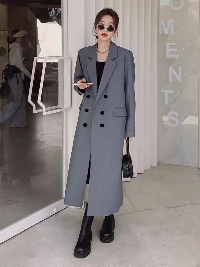 Black long suit trench coat for women, featuring a tailored design for spring and autumn outfits