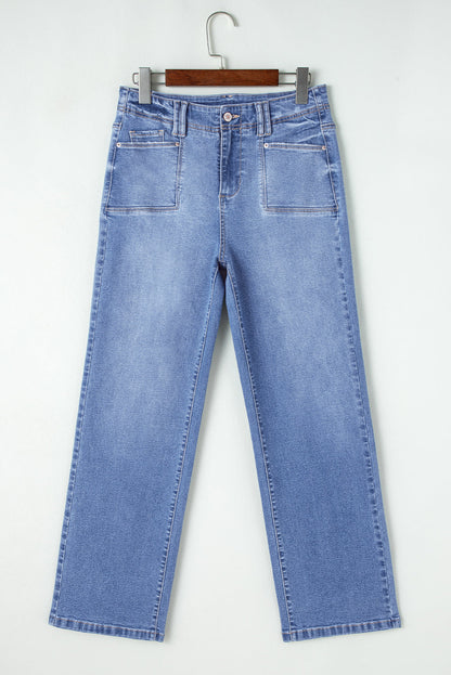 Light blue Tinsley high waist jeans by Threaded Pear with classic five-pocket design and fitted silhouette.