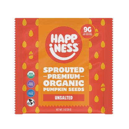 Happiness Minis sprouted organic pumpkin seeds in a red and orange packet labeled unsalted, with USDA Organic, GMO-free, and gluten-free icons.