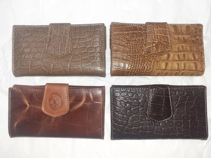 Handmade women's wallet with multiple card slots and a sleek design, crafted from high-quality leather.