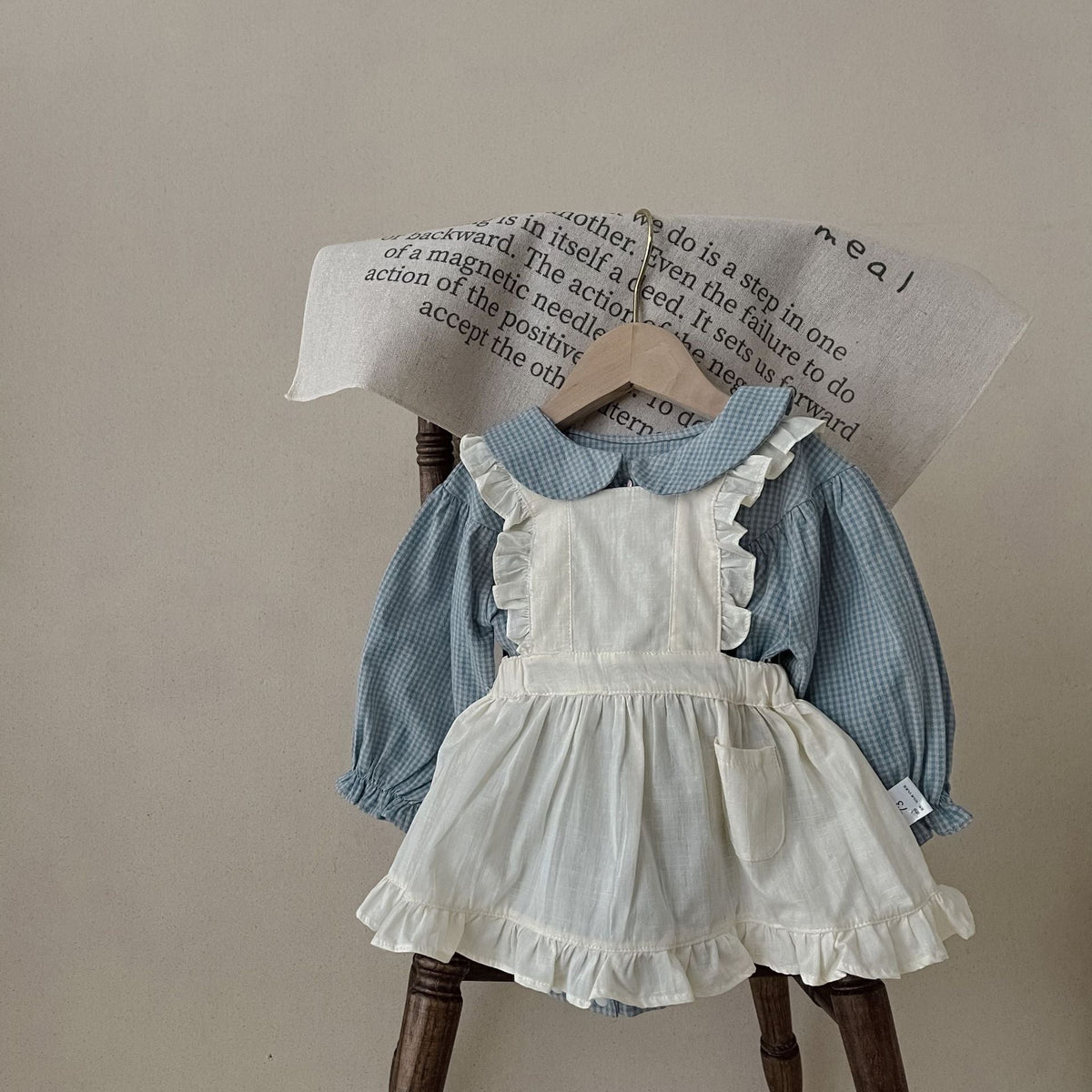 Infant small plaid long-sleeve single-breasted romper with sling-style overskirt