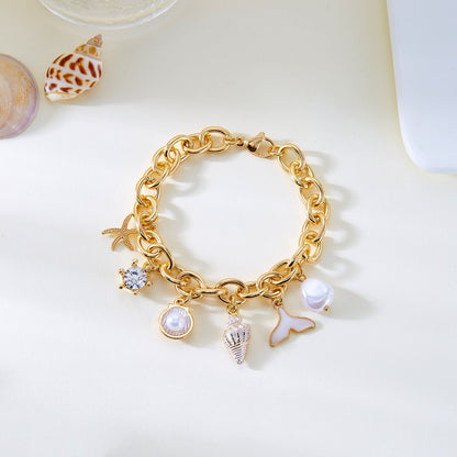 Women's starfish, pearl, and shell fishtail multi-pendant necklace and bracelet set