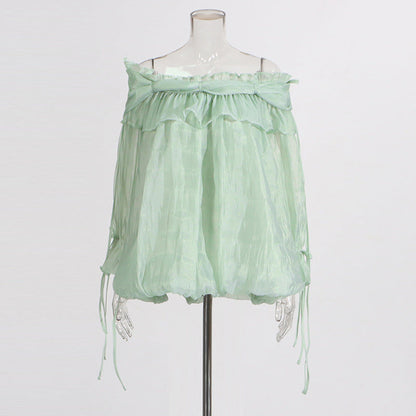 Retro off-the-shoulder chiffon top with strap details and flowing bell sleeves in a solid color