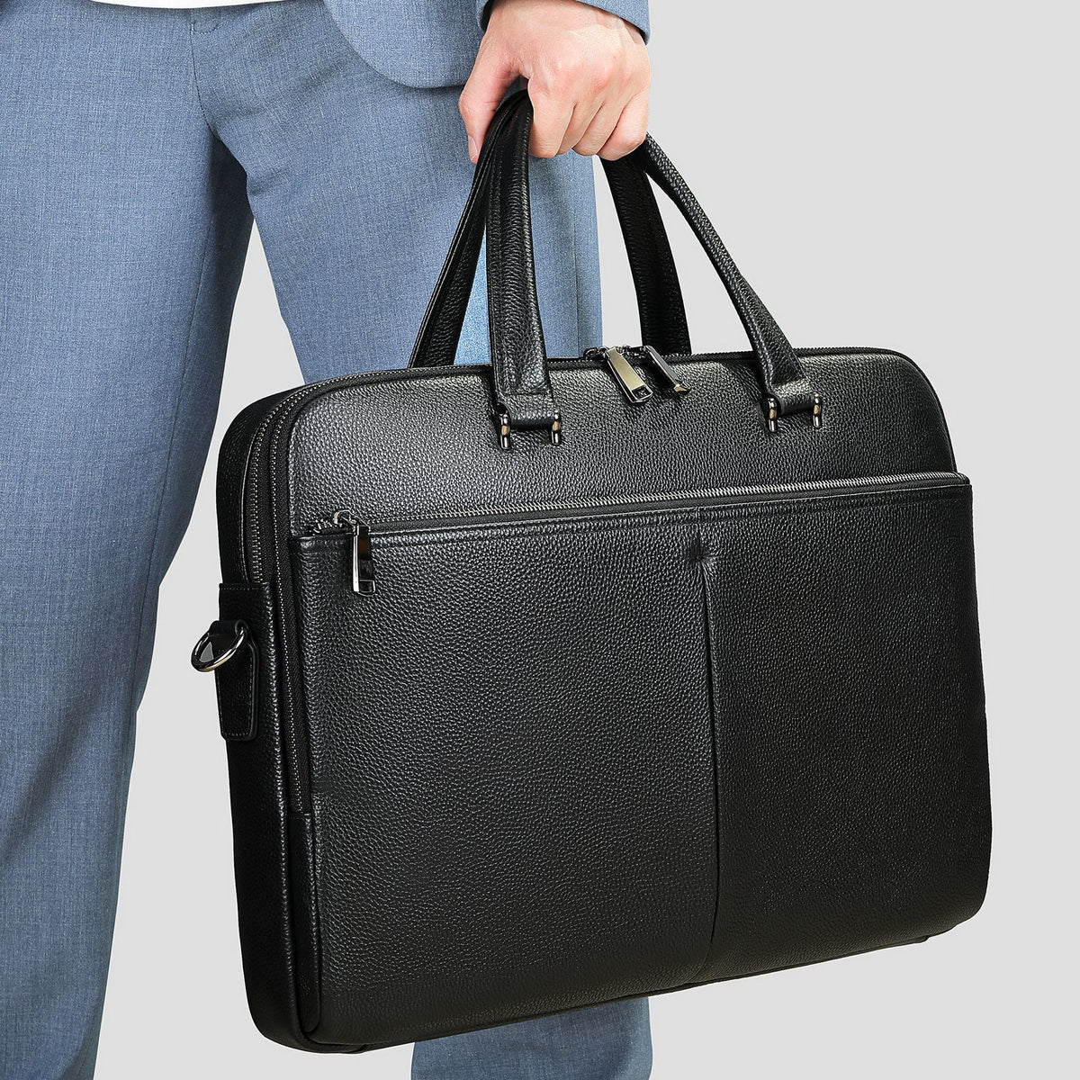 Men's horizontal cowhide briefcase with large capacity for 17-inch computer, featuring a structured handbag design