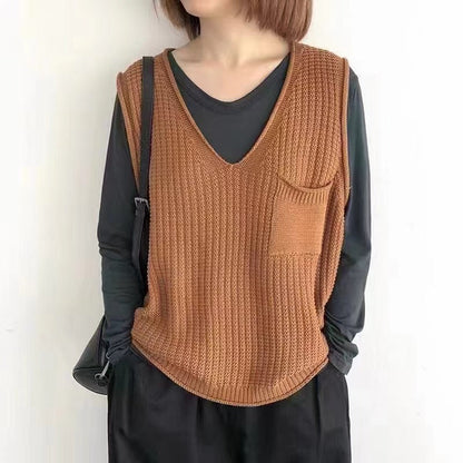 Simple V-neck artistic knit vest in a textured design, front view