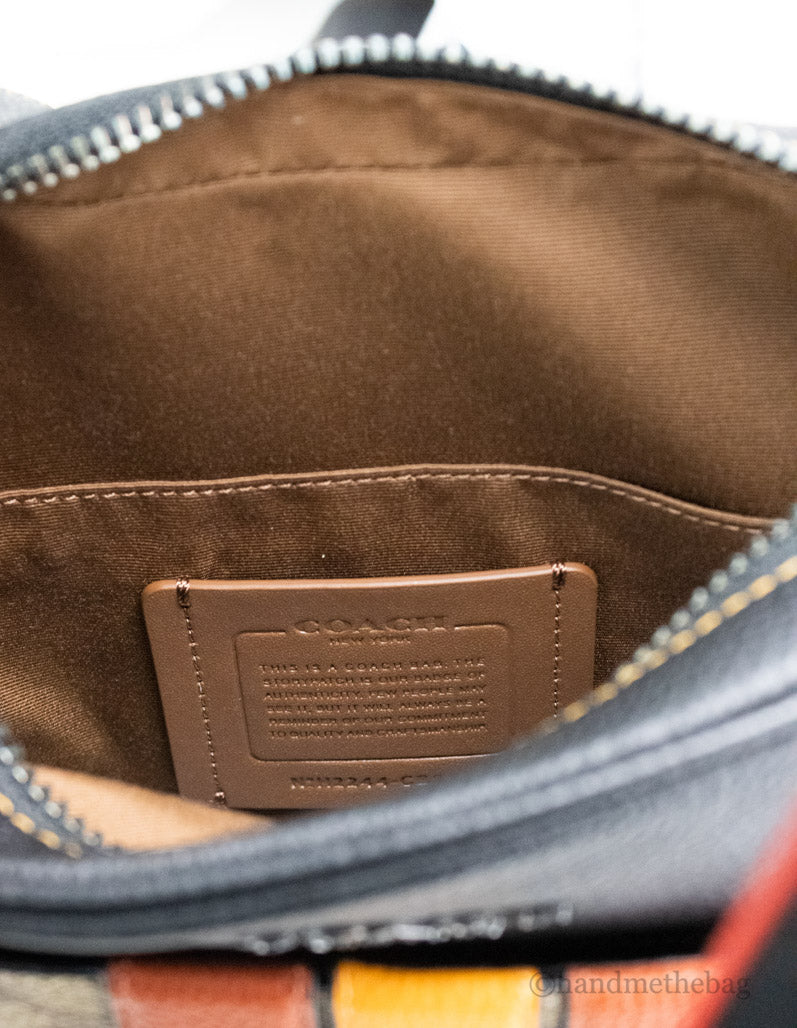 Coach Hudson 21 khaki terracotta signature varsity stripe crossbody bag with adjustable strap and logo details.