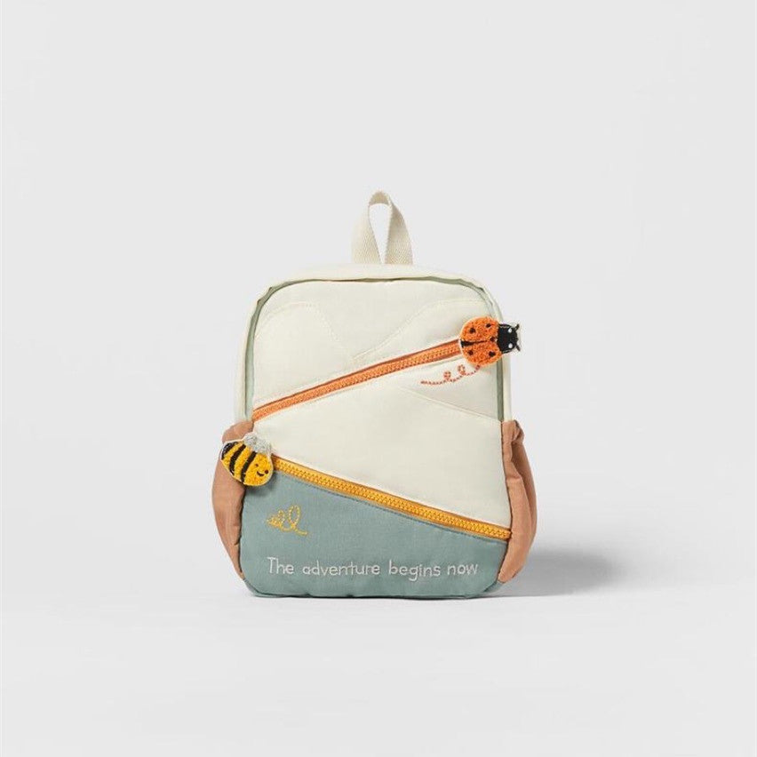 Children's animal shoulder bag with decorative color-matching design