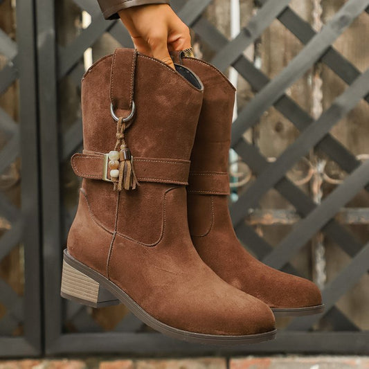 Thin thick-soled Martin boots with elastic suede ankle panels in black suede.