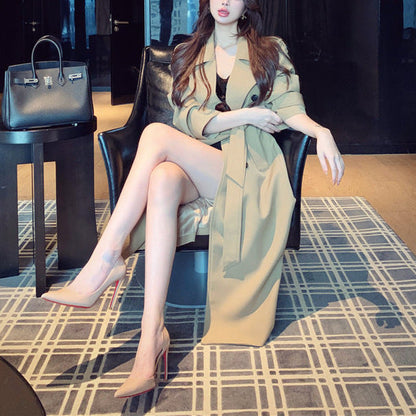 Women’s high-end double-breasted trench coat in a structured, classic design