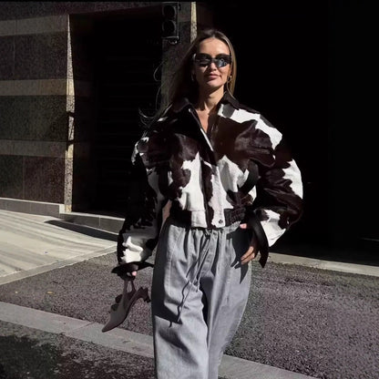 Street-style cow-print hoodless short jacket, front view