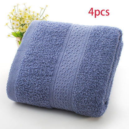 Thickened bath towel beach towel, soft textured fabric in a solid color, displayed flat