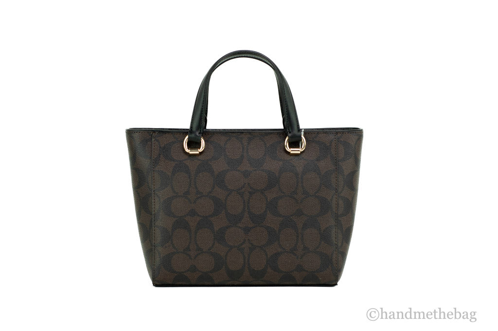 Brown and black Coach CA613 Alice small crossgrain leather satchel with crossbody strap, convertible bag style, shown with strap and interior.