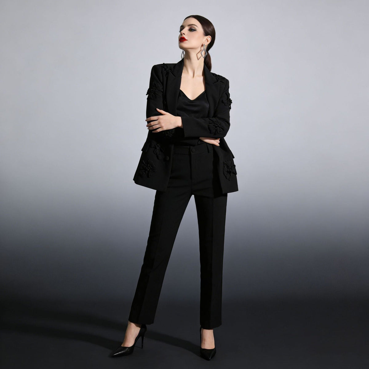 Three-dimensional floral blazer for women featuring textured flower appliqués and a structured silhouette