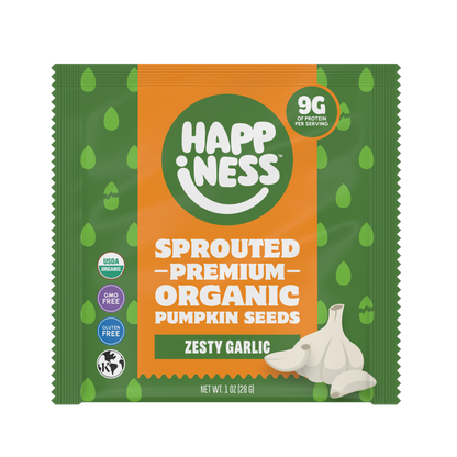 Packet of Happiness Minis sprouted premium organic pumpkin seeds with zesty garlic flavor, green and orange packaging, featuring garlic illustration.
