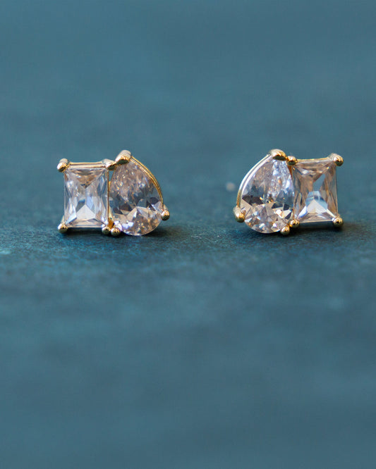 Downeast C'Est Bon Studs earrings featuring small, elegant gold-tone studs with a polished finish.