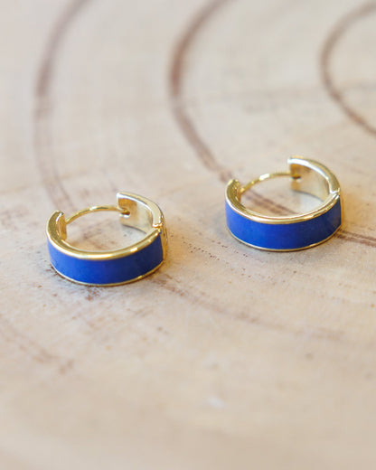 Downeast Blue Moon Huggie Hoops earrings featuring small, sleek blue moon-shaped hoops for a stylish jewelry look